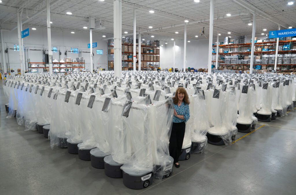 Woman with robots in plastic wrap